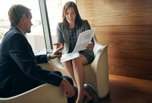 Advice, man and woman in office with document, sales data or finance consultation for budget plan